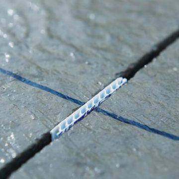 Snapped line on a green slab, ready for the saw