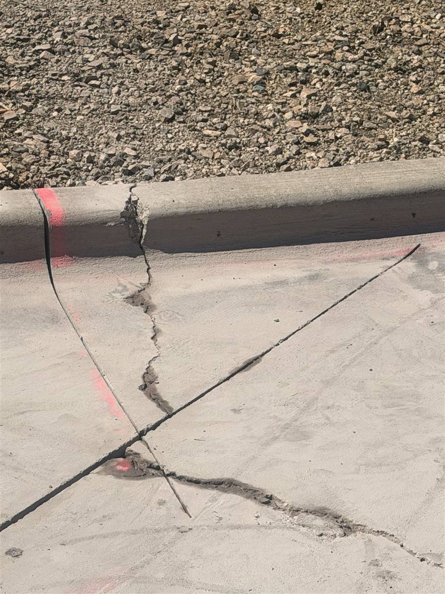 Saw cuts eight inches deep through a concrete slab and curb at the Walmart in Douglas, Arizona