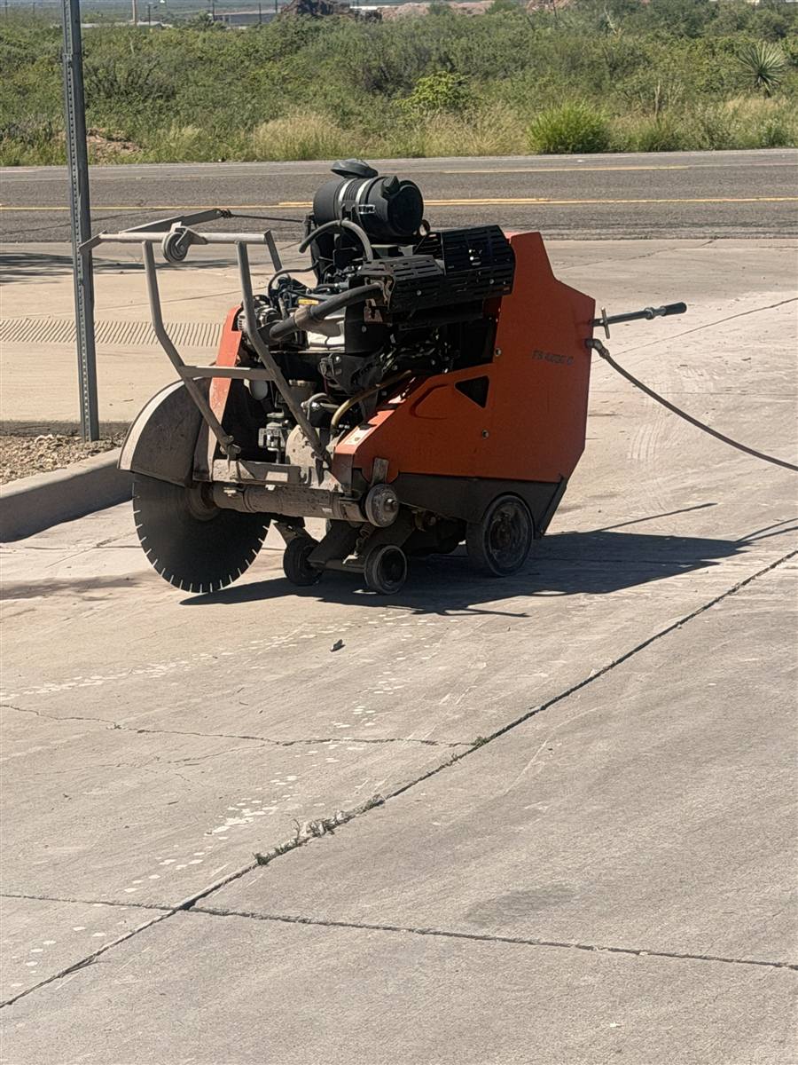 47 horsepower Husqvarna walk-behind slab saw on the concrete behind the Walmart in Douglas, Arizona
