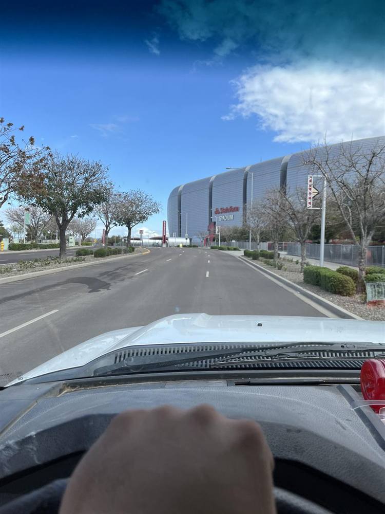 Pulling up to State Farm Stadium in Glendale, Arizona, in a Concrete Coring Company truck for a core drilling job