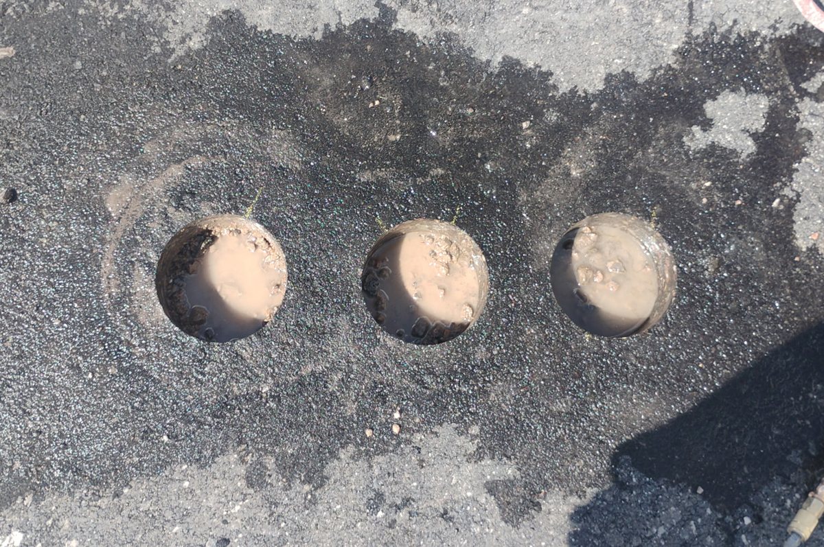 Six inch cores drilled through asphalt at the Costco in Prescott, Arizona