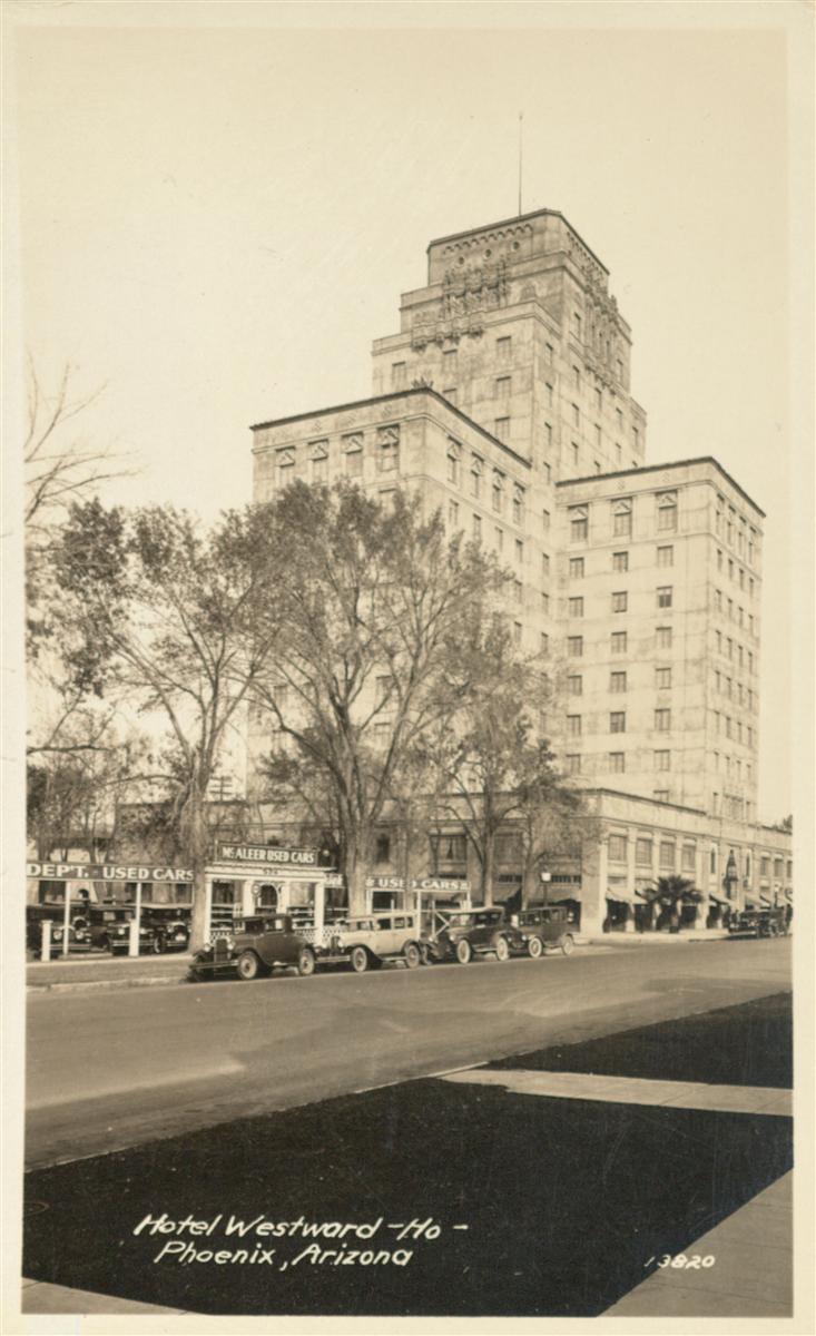 Real-photo postcard of the Hotel Westward Ho in downtown Phoenix around 1930, before the radio mast, with Model A cars parked out front